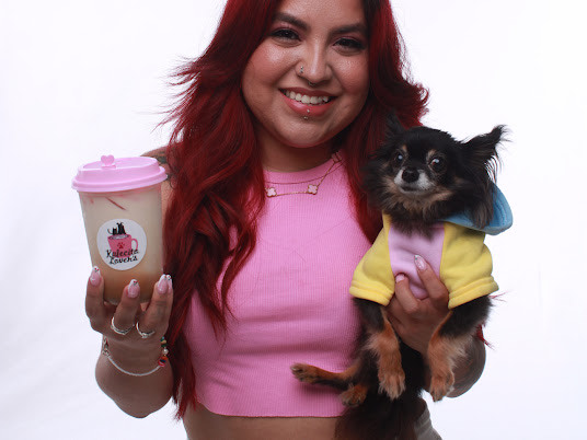 Dog hanging out by the coffee cart